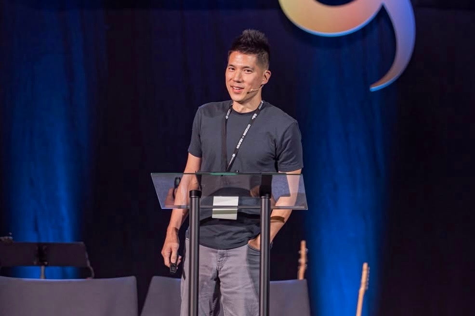 Dr. Jin Taek Chung speaking at a podium